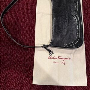 Salvatore Ferragamo Black Shoulder Bag with Sleek Design and Glossy Finish